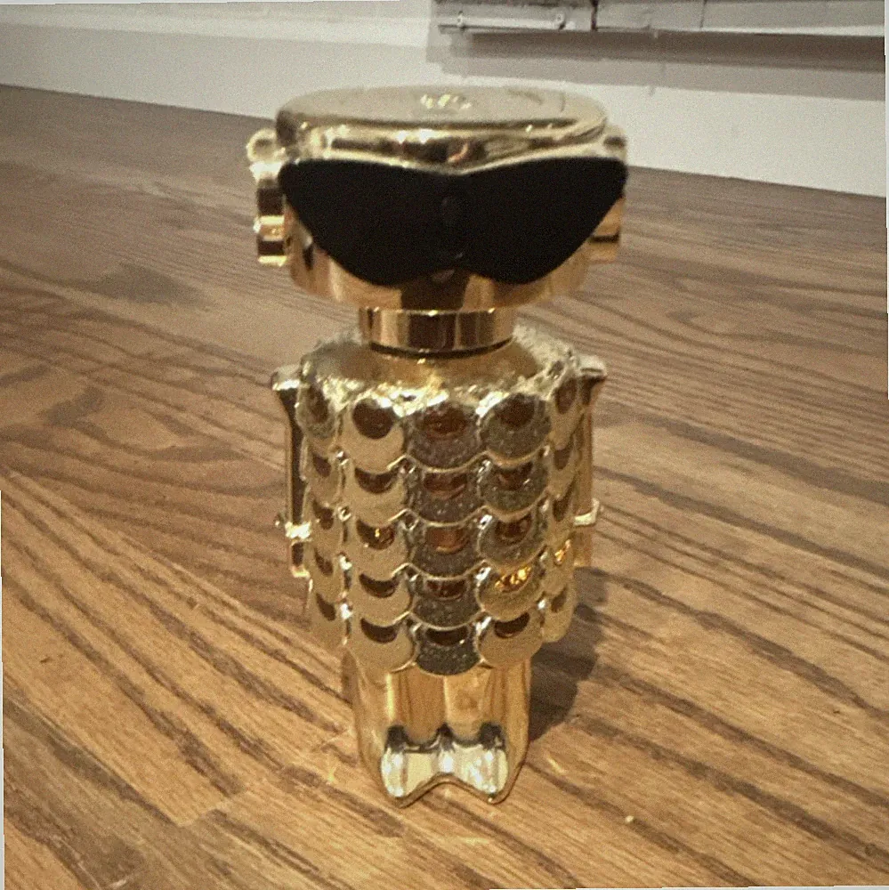Fame Intense Eau de Parfum Perfume Bottle Gold Robot Design 1.7 oz 50 ml